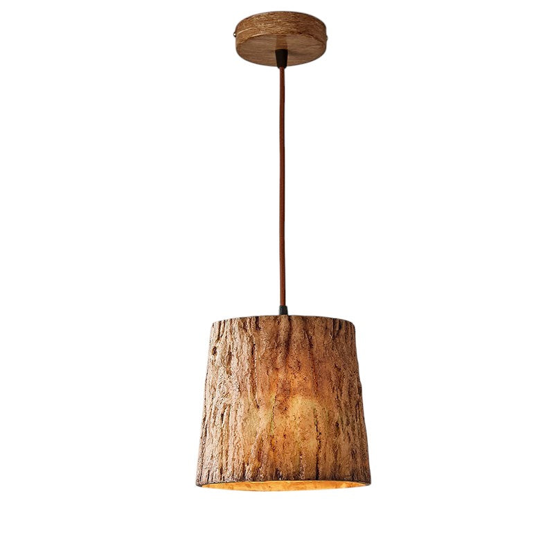 Lampada a sospensione con tronco di legno