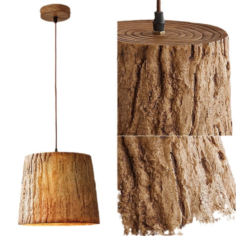 Lampada a sospensione con tronco di legno